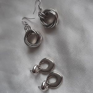 Silver toned earrings. pierced ears. Love Knot and small drop…